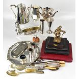 A quantity of silver plated items including a salver raised on ball and claw feet, teapot,