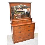 An Edwardian mahogany mirror back dressing table with string inlay,