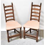 MONASTIC WOODCRAFT FURNITURE LTD; a set of six ladder back rush-seated chairs,