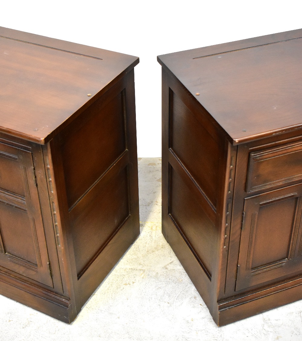 ERCOL; two dark dresser bases, one with a pair of fielded and panelled cupboard doors, - Image 4 of 6