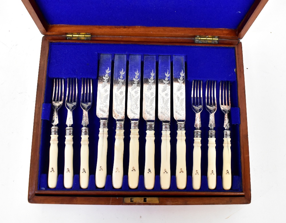 A cased set of twelve silver plated cake knives and forks with bone handles, initialled 'A',