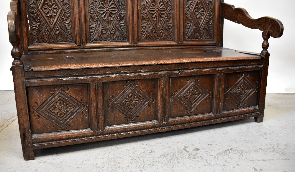 A Georgian carved oak settle, - Image 2 of 5