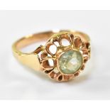 A 9ct yellow gold ring set with central pale green stone, size O, Polish hallmark .800, approx 3.4g.