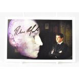 ROBERT CARLISLE; a James Bond promotional postcard bearing the actor's signature.