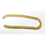 An 18ct yellow gold flat link necklace with wavy shaped links, marked 750, length 46cm, approx 59.