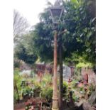 A Victorian cast iron street lamp,