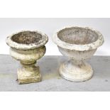 Two white painted reconstituted garden urns, both to stepped bases, the largest 43 x 48cm (2).