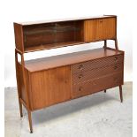NATHAN; a mid-20th century 'Highboard' sideboard, with upper glazed sliding door section,