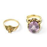 A 9ct yellow gold ladies' dress ring set with oval faceted cut amethyst stone,