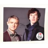 SHERLOCK; a coloured photograph bearing the signatures of Benedict Cumberbatch and Martin Freeman,