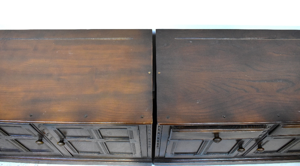 ERCOL; two dark dresser bases, one with a pair of fielded and panelled cupboard doors, - Image 6 of 6