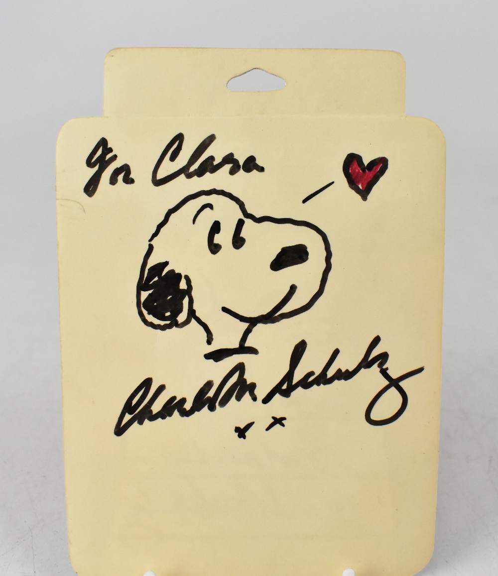 SNOOPY; a sticker bearing the signature of Charles Schulz both front and back, - Image 3 of 3