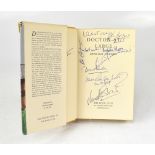 DOCTOR AT LARGE; a Book Club edition bearing multiple signatures of the cast.