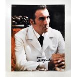 CHRISTOPHER LEE; a coloured photograph of the acting star, bearing his signature, 25 x 20cm.