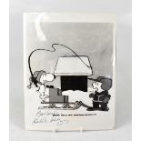 SNOOPY; a promotional photograph from 1978, bearing the signature of Charles Schulz, 23 x 17cm.