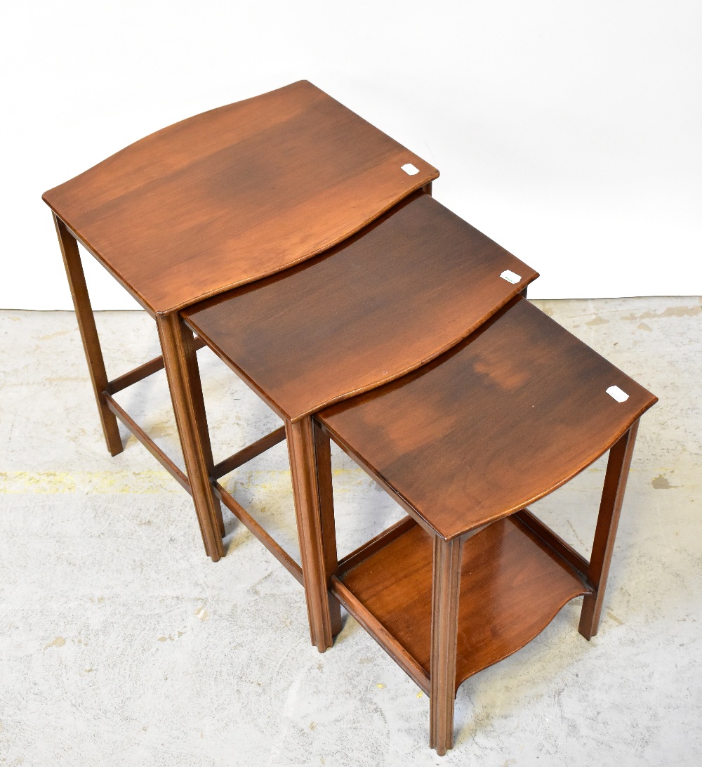 WARING & GILLOW; a nest of three occasional tables with shaped tops and reeded stretchered uprights, - Image 3 of 4