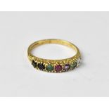 A 9ct gold acrostic ring set with seven multi-coloured stones spelling 'Dearest', size P, approx 1.