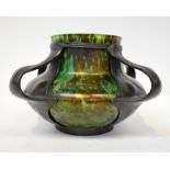 An Austrian Art Nouveau brass vase with mottled brown and green pattern,
