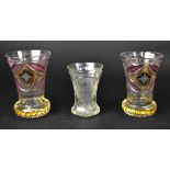 A near pair of 19th century Bohemian glass vases with ruby and amber glass overlay,