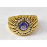 A tanzanite and diamond college-style gold ring,