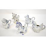 Five collectible jugs, each in the form of an animal, to include a horse, pig, rabbit, hen and cat,