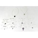 Eight sterling silver mounted gem set necklace pendants on silver chains,