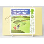 SEVERIANO BALLESTEROS; a card bearing the legendary golfer's signature.