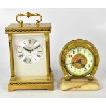 A Rapport brass-effect carriage clock, the chapter ring set with Roman numerals, height 19cm,