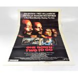 ONE DOWN, TWO TO GO; a folded poster for the film, bearing the signatures of Jim Kelly,