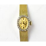 HAMILTON; a ladies' 1970s 14ct gold and diamond wristwatch,
