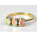 A 9ct gold three-stone Mystic Topaz trilogy ring, size O, approx 2g.