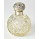 A late Victorian hobnail cut glass and hallmarked silver mounted scent bottle of globular form,