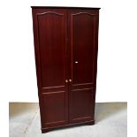 STAG; a mahogany two-door wardrobe, 187 x 92 x 59cm.