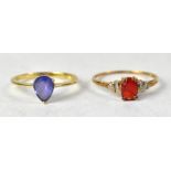 Two 9ct gold rings, one with a pear-shaped claw set tanzanite, approx 1ct,