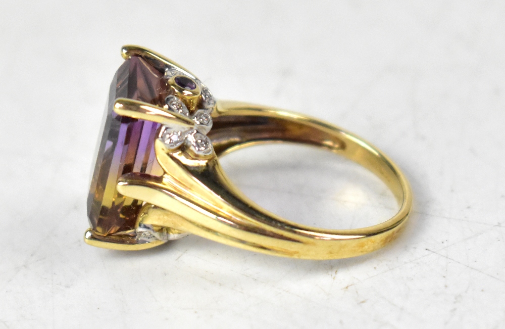 A 9ct yellow gold ring with an emerald cut ametrine bi-colur stone, on an ornate mount, size N, - Image 2 of 3