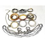 A quantity of costume jewellery to include bangles, etc.