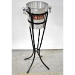 A vintage Piper Champagne bucket in black metal stand, height 73cm,