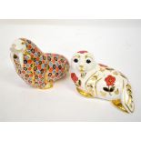 ROYAL CROWN DERBY; two Imari decorated porcelain animal paperweights, comprising a white seal,