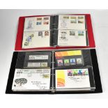 Four albums containing first day covers and some loose stamps,