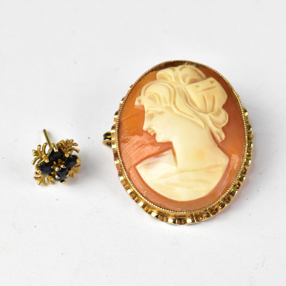 An oval carved shell cameo brooch, head and shoulders of a lady in 9ct gold mount,