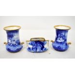 ROYAL DOULTON; a pair of 'Blue Children' campana-style vases,