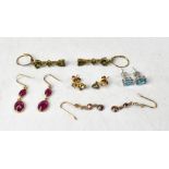 Five pairs of 9ct gold earrings comprising a pair of double bezel set ruby drops on a French hoop,