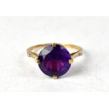 A 9ct gold amethyst and diamond ring,