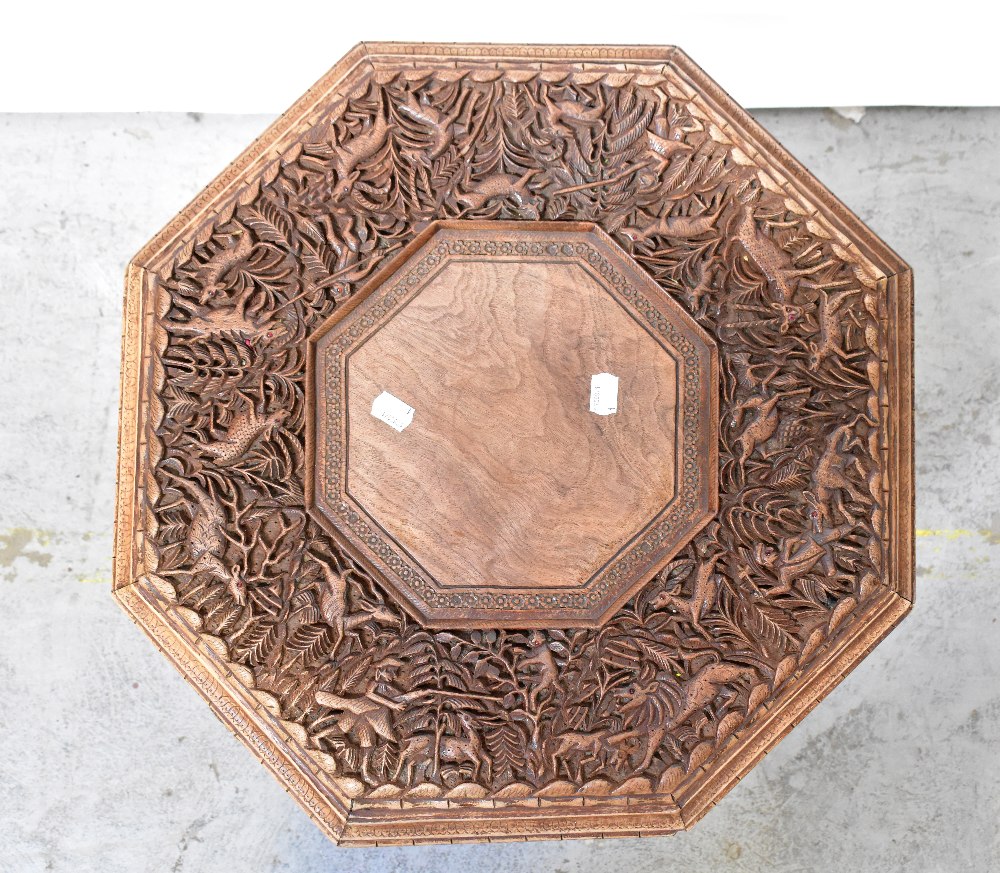 An Indian carved hardwood octagonal-topped occasional table, - Bild 2 aus 2