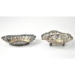An Edwardian hallmarked silver pierced bonbon dish of oval form with Rococo-style scrolls,