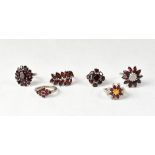 Six garnet and sterling silver rings, comprising a Mozambique garnet,