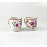 Two late 19th century coffee cups in the Famille Rose palette,