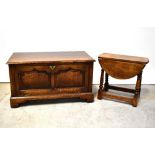 A small swivel top oak gateleg coffee table with turned supports to stile feet,