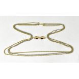 CHRISTIAN DIOR; a yellow and white metal twist link triple chain necklace,