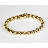 A 9ct gold hollow link helical twist bracelet, with tongue fastener, length approx 18cm, approx 19.